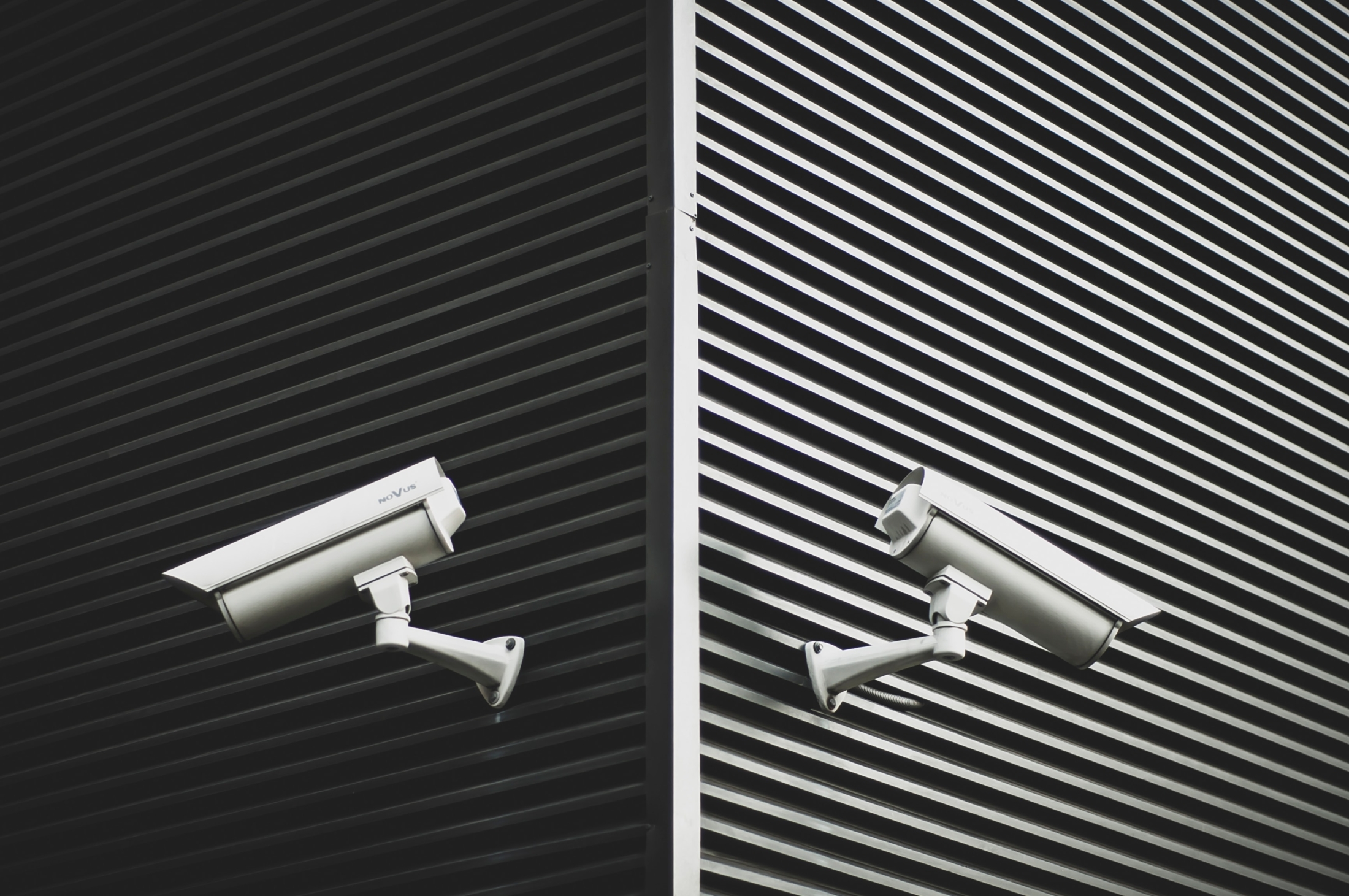 Two Grey Cctv Cameras